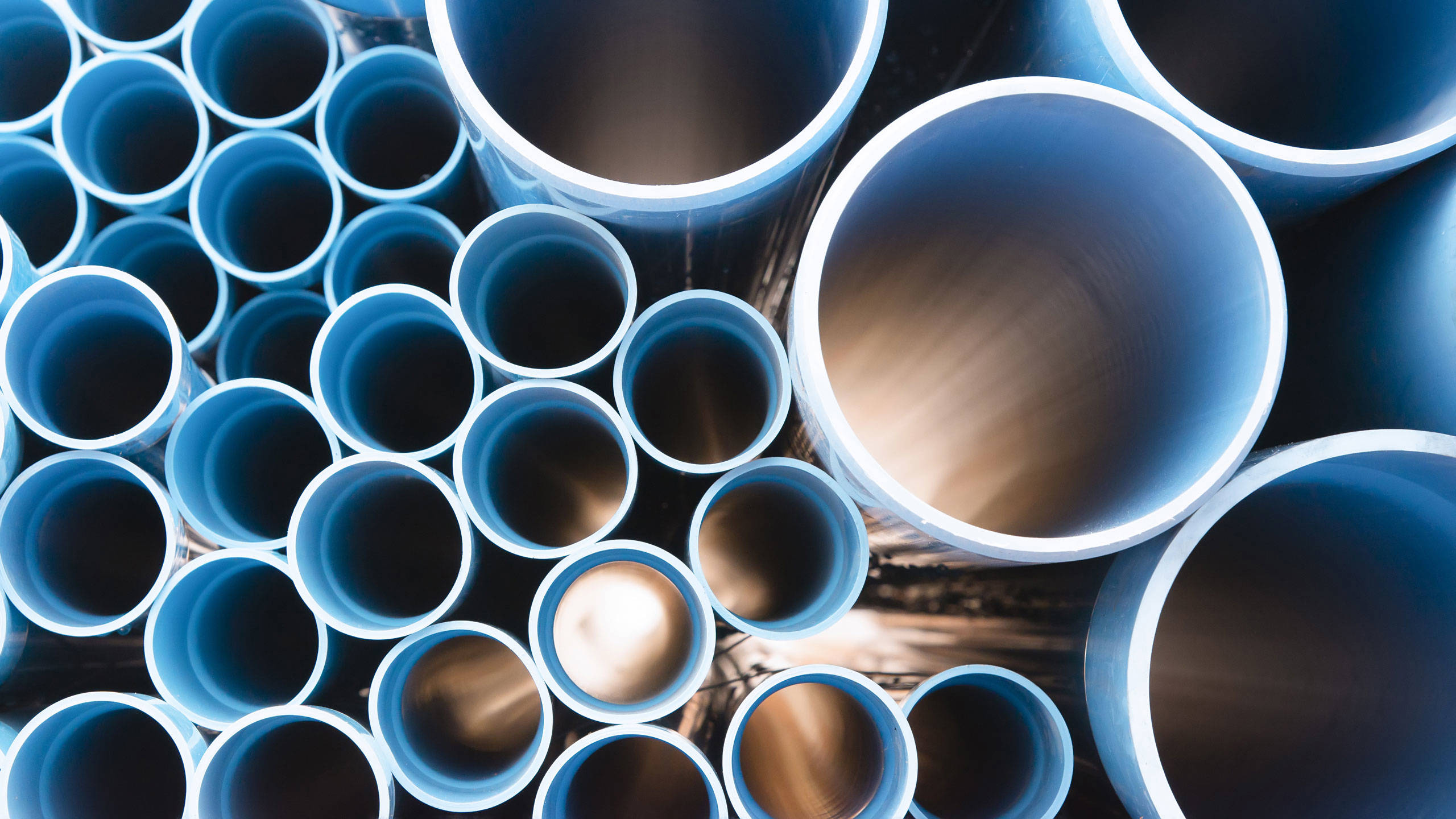 Water pipes stacked in a pile